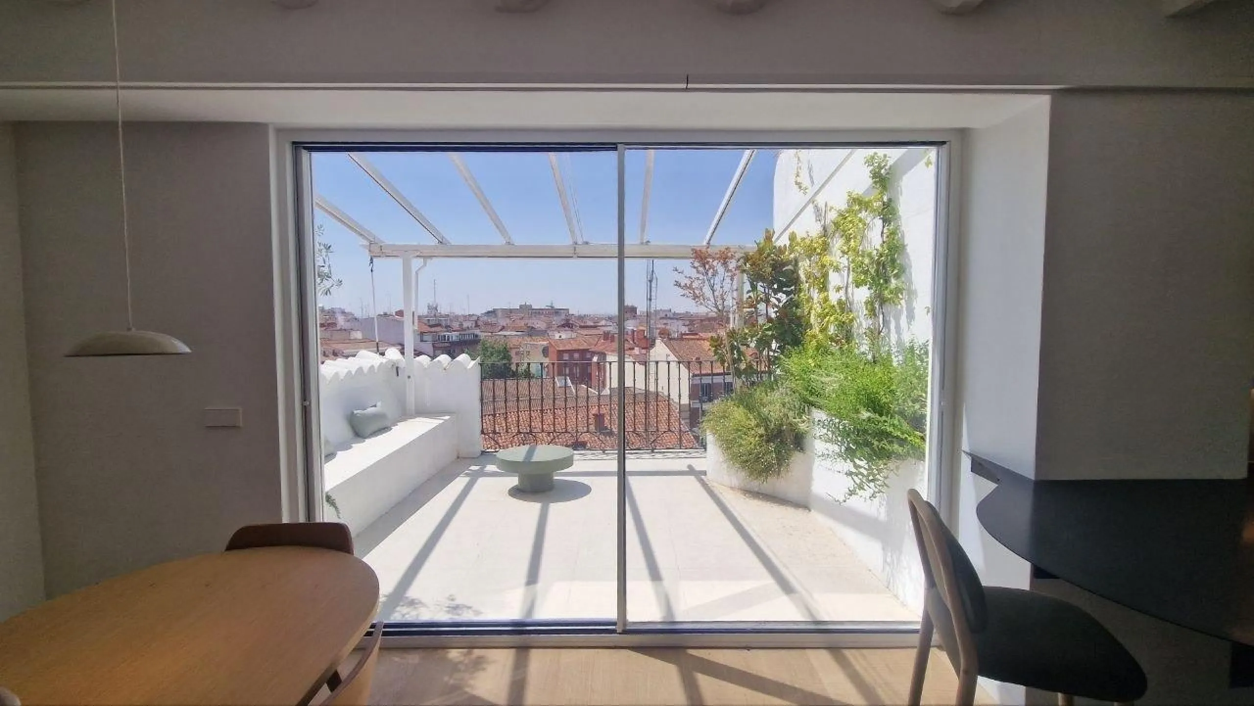 Penthouse with designer renovation and two terraces, in a historic building in the Palacio neighborhood.