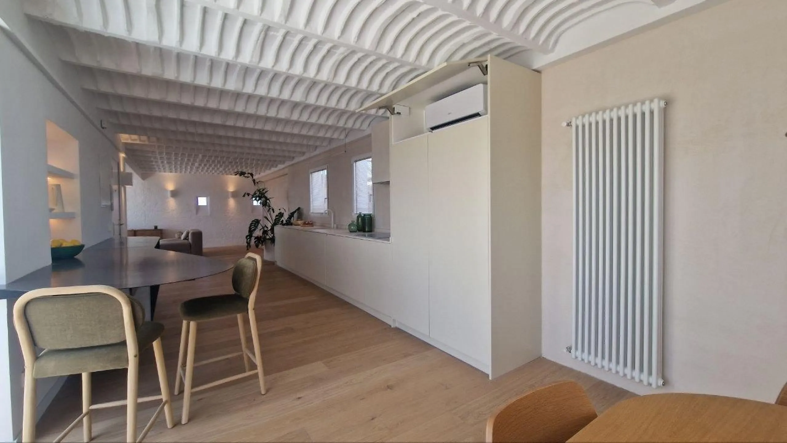 Penthouse with designer renovation and two terraces, in a historic building in the Palacio neighborhood.