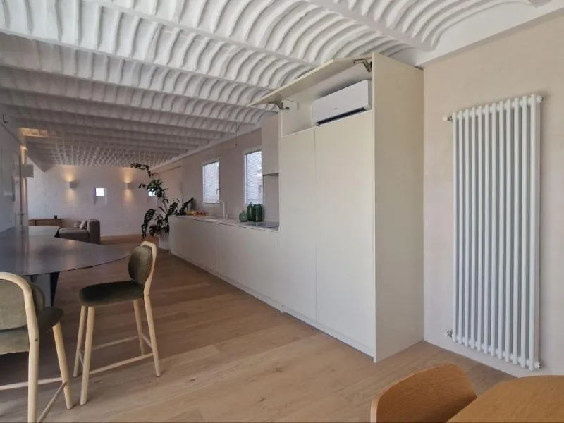 Penthouse with designer renovation and two terraces, in a historic building in the Palacio neighborhood.