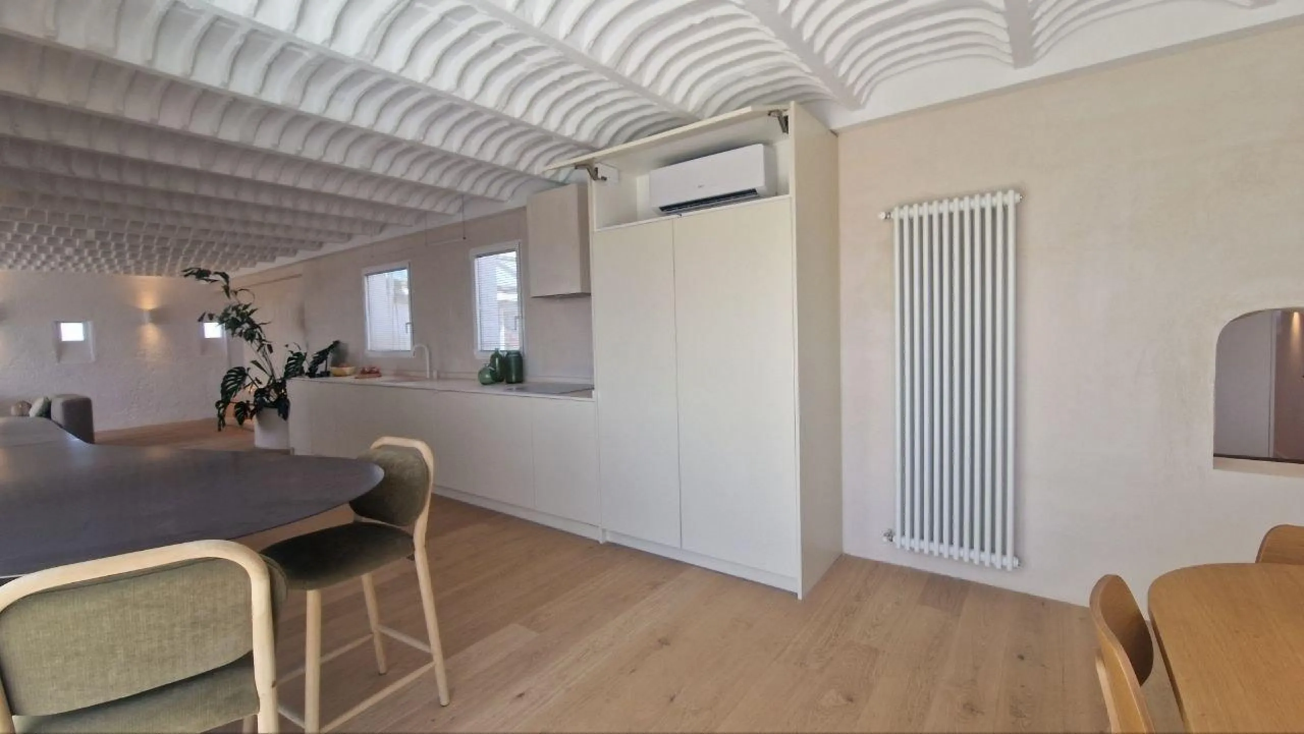 Penthouse with designer renovation and two terraces, in a historic building in the Palacio neighborhood.