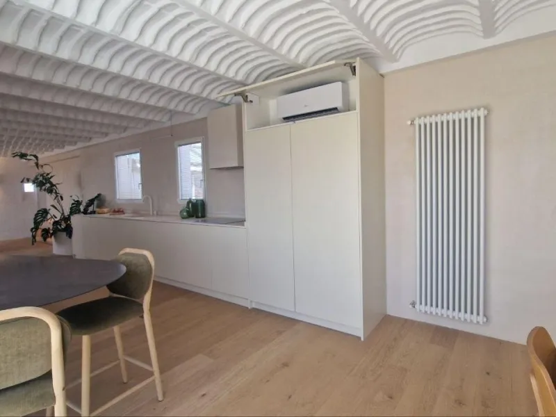 Penthouse with designer renovation and two terraces, in a historic building in the Palacio neighborhood.