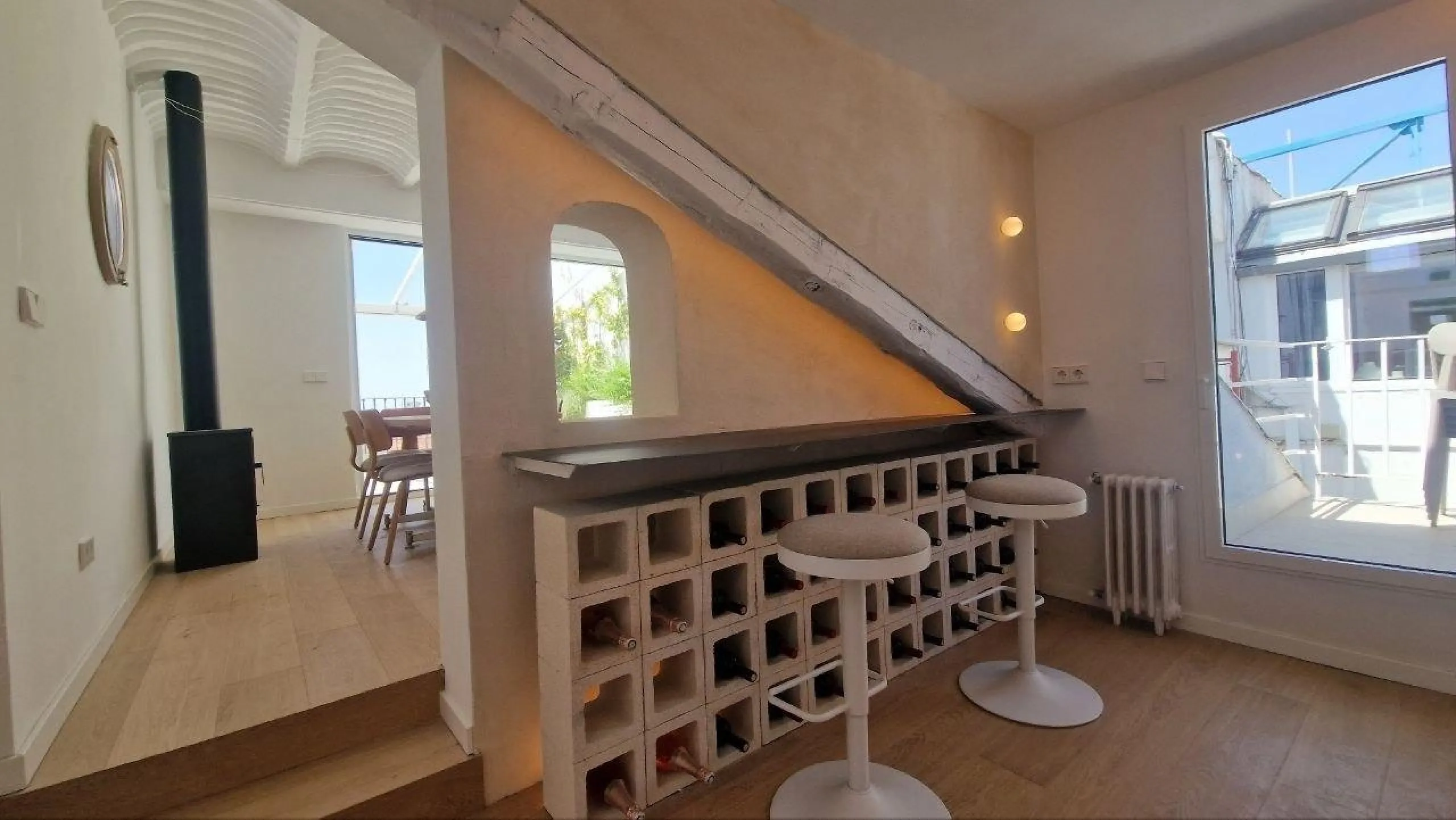 Penthouse with designer renovation and two terraces, in a historic building in the Palacio neighborhood.