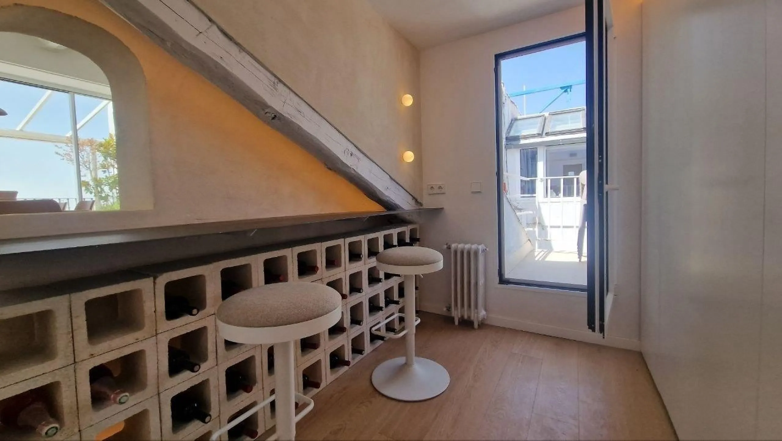 Penthouse with designer renovation and two terraces, in a historic building in the Palacio neighborhood.