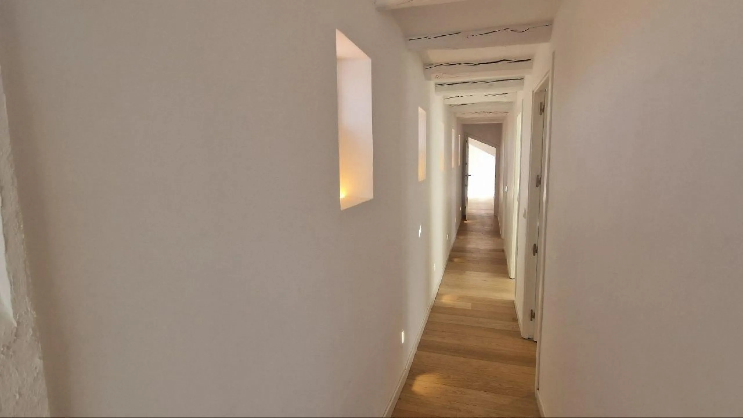 Penthouse with designer renovation and two terraces, in a historic building in the Palacio neighborhood.