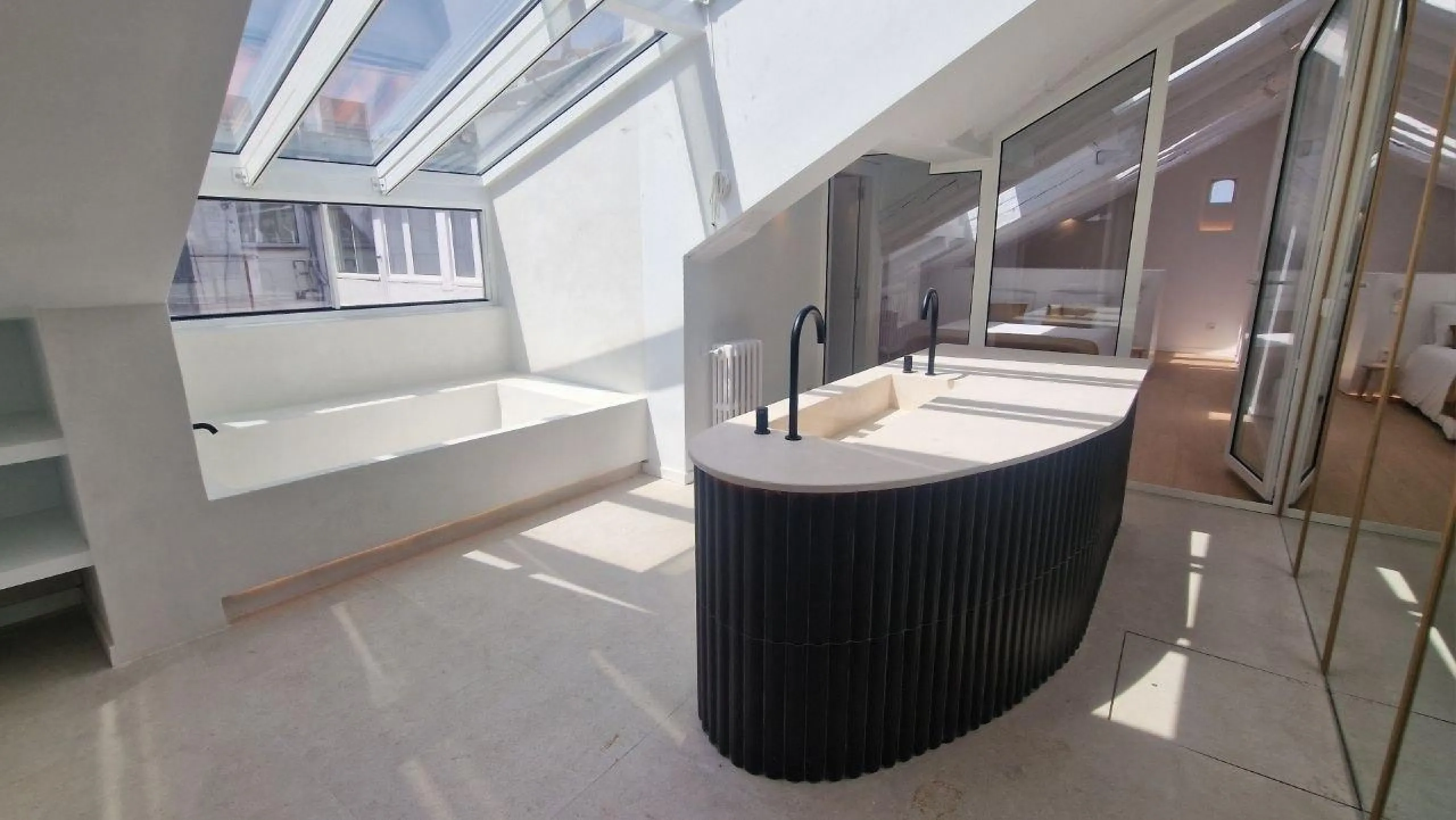 Penthouse with designer renovation and two terraces, in a historic building in the Palacio neighborhood.