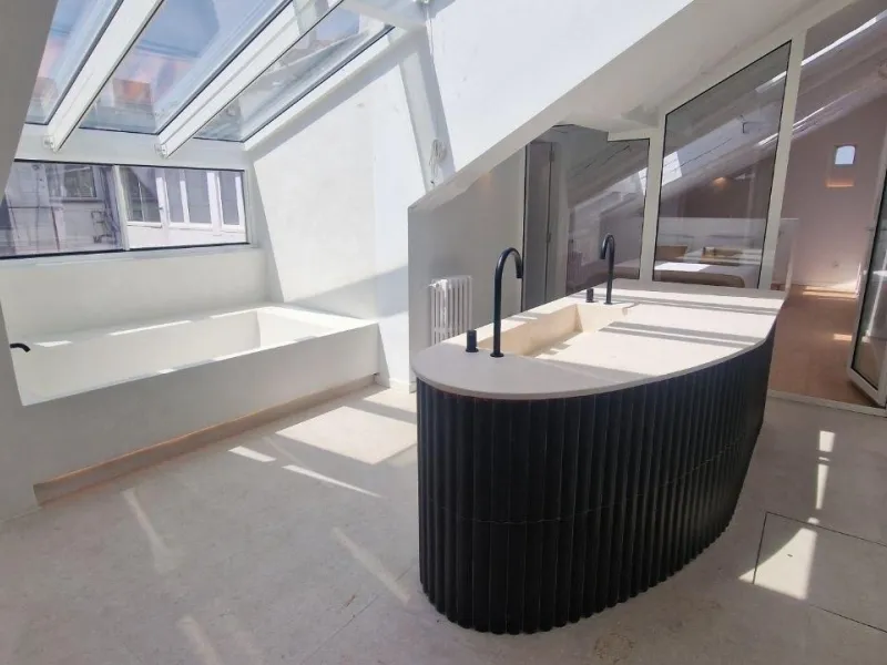 Penthouse with designer renovation and two terraces, in a historic building in the Palacio neighborhood.
