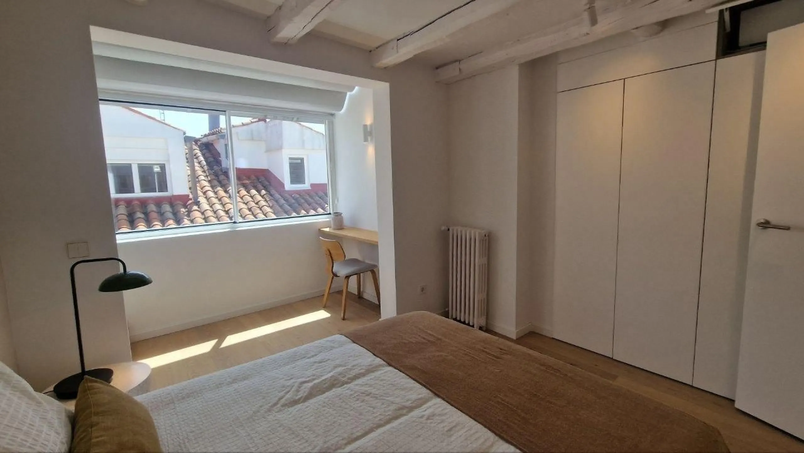 Penthouse with designer renovation and two terraces, in a historic building in the Palacio neighborhood.