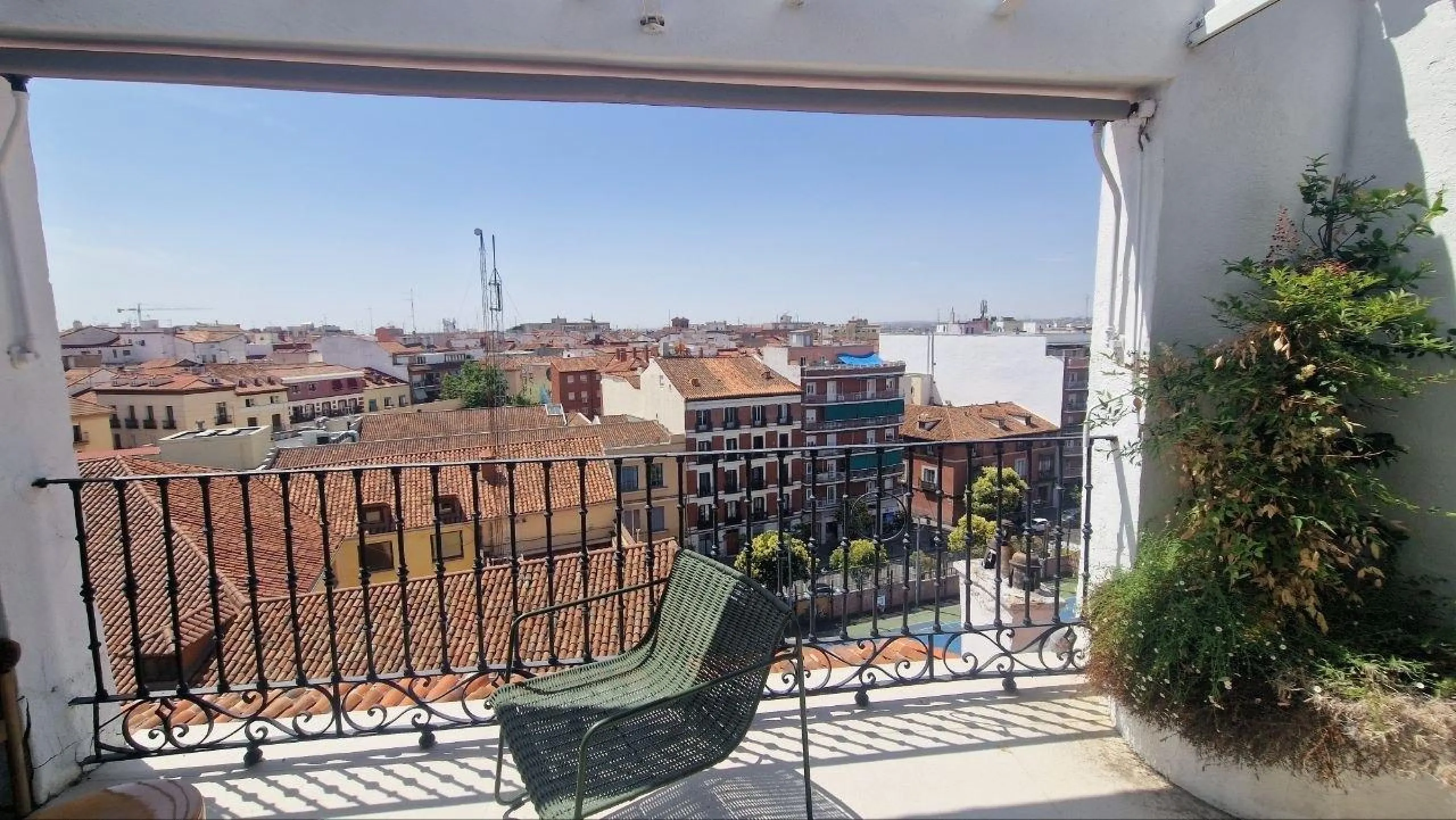 Penthouse with designer renovation and two terraces, in a historic building in the Palacio neighborhood.