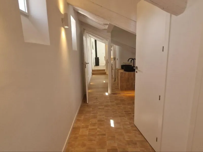 Penthouse with designer renovation and two terraces, in a historic building in the Palacio neighborhood.