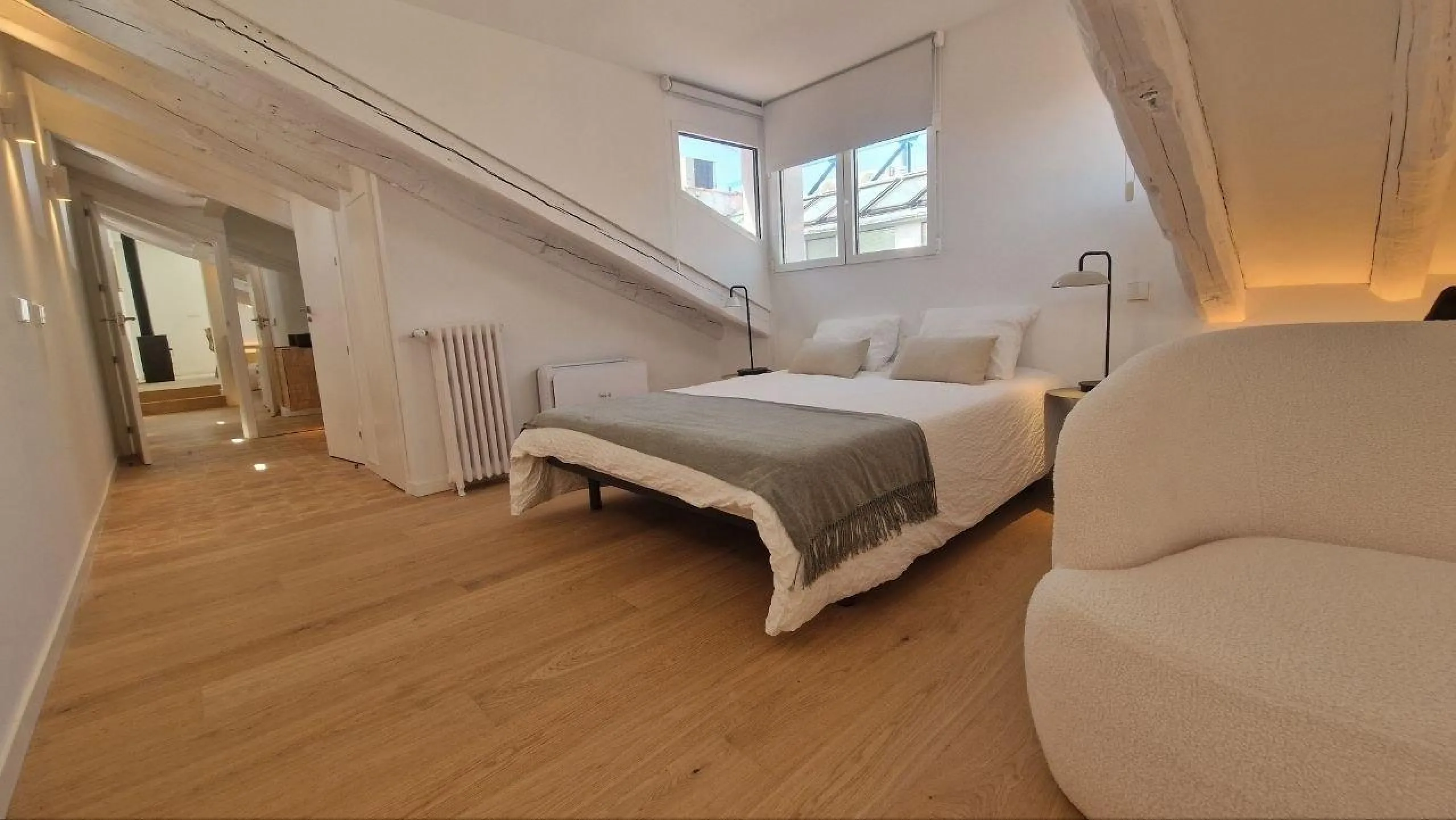 Penthouse with designer renovation and two terraces, in a historic building in the Palacio neighborhood.