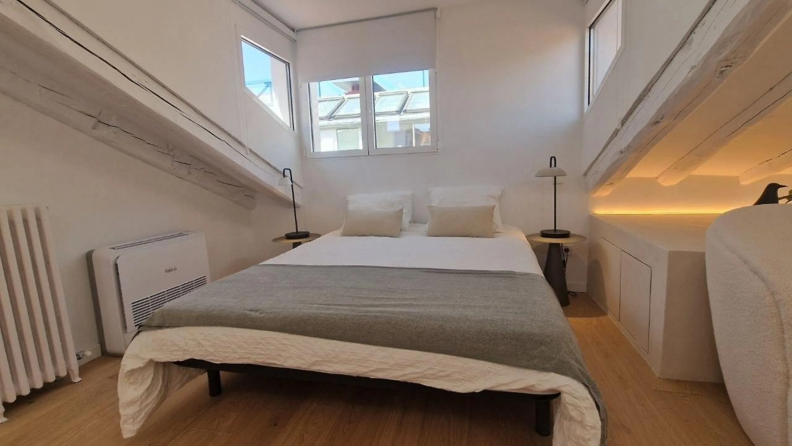 Penthouse with designer renovation and two terraces, in a historic building in the Palacio neighborhood.