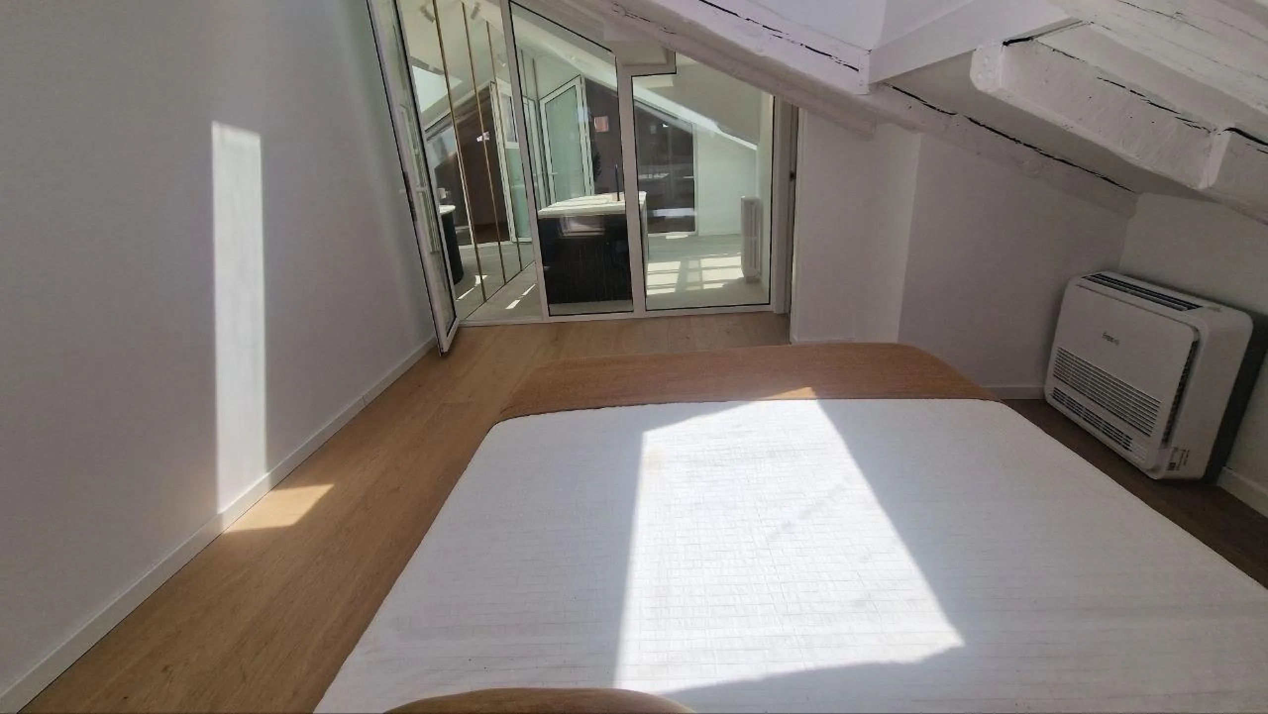 Penthouse with designer renovation and two terraces, in a historic building in the Palacio neighborhood.