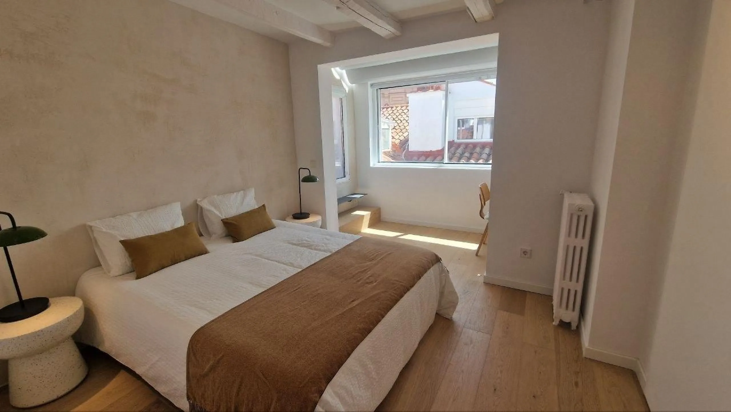 Penthouse with designer renovation and two terraces, in a historic building in the Palacio neighborhood.