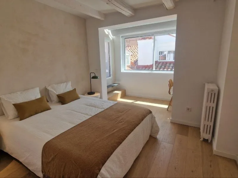 Penthouse with designer renovation and two terraces, in a historic building in the Palacio neighborhood.