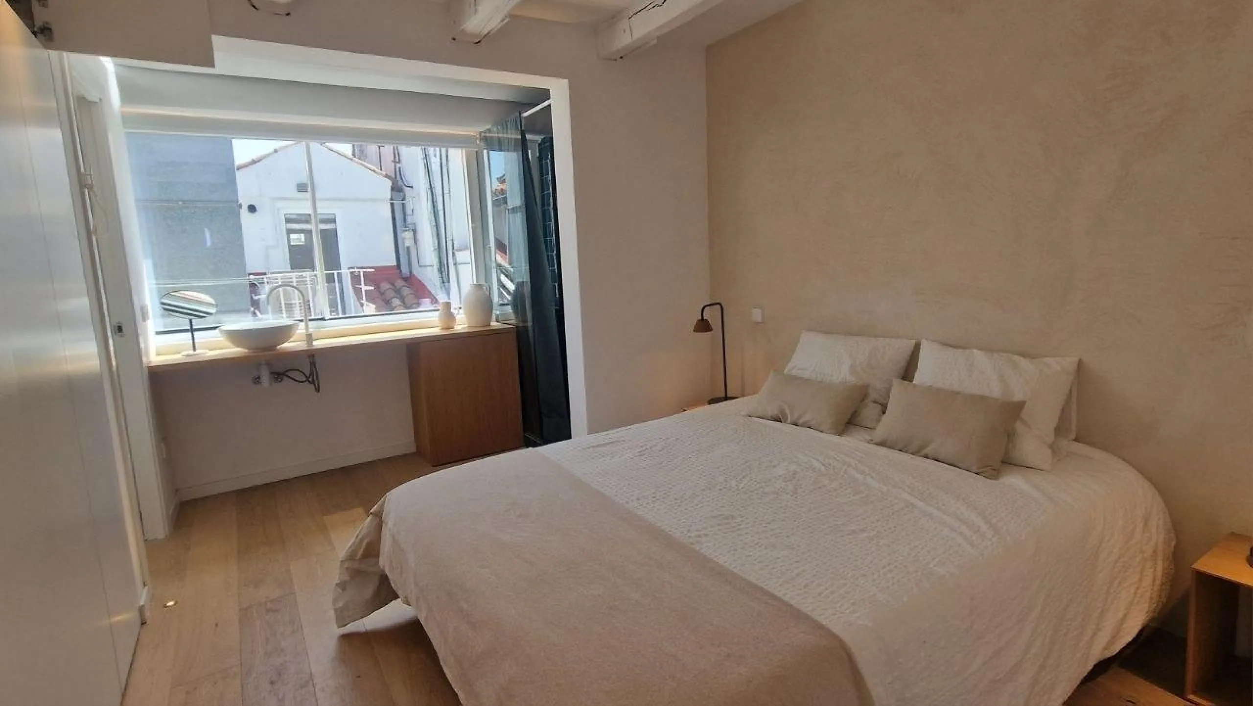 Penthouse with designer renovation and two terraces, in a historic building in the Palacio neighborhood.