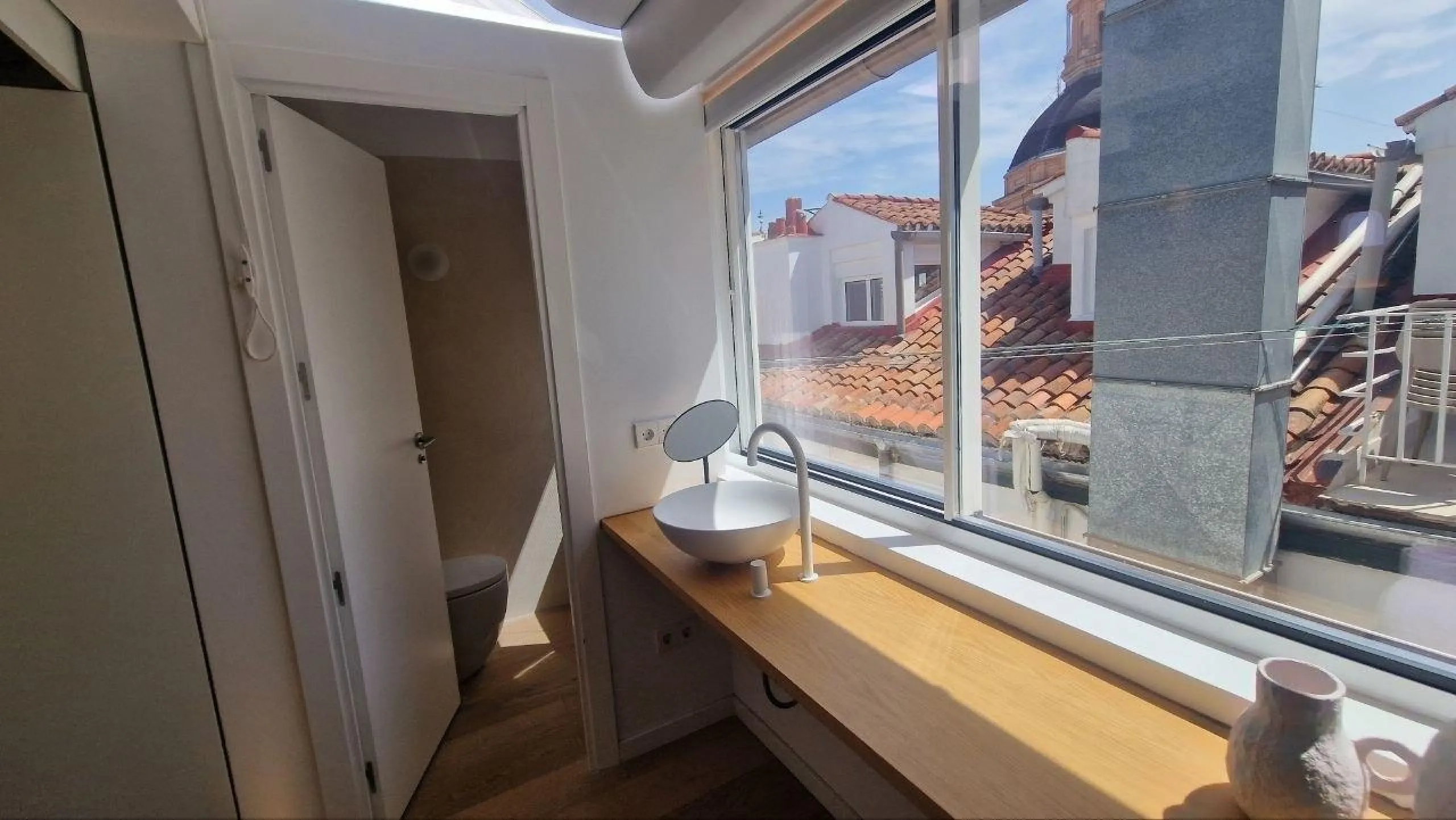 Penthouse with designer renovation and two terraces, in a historic building in the Palacio neighborhood.