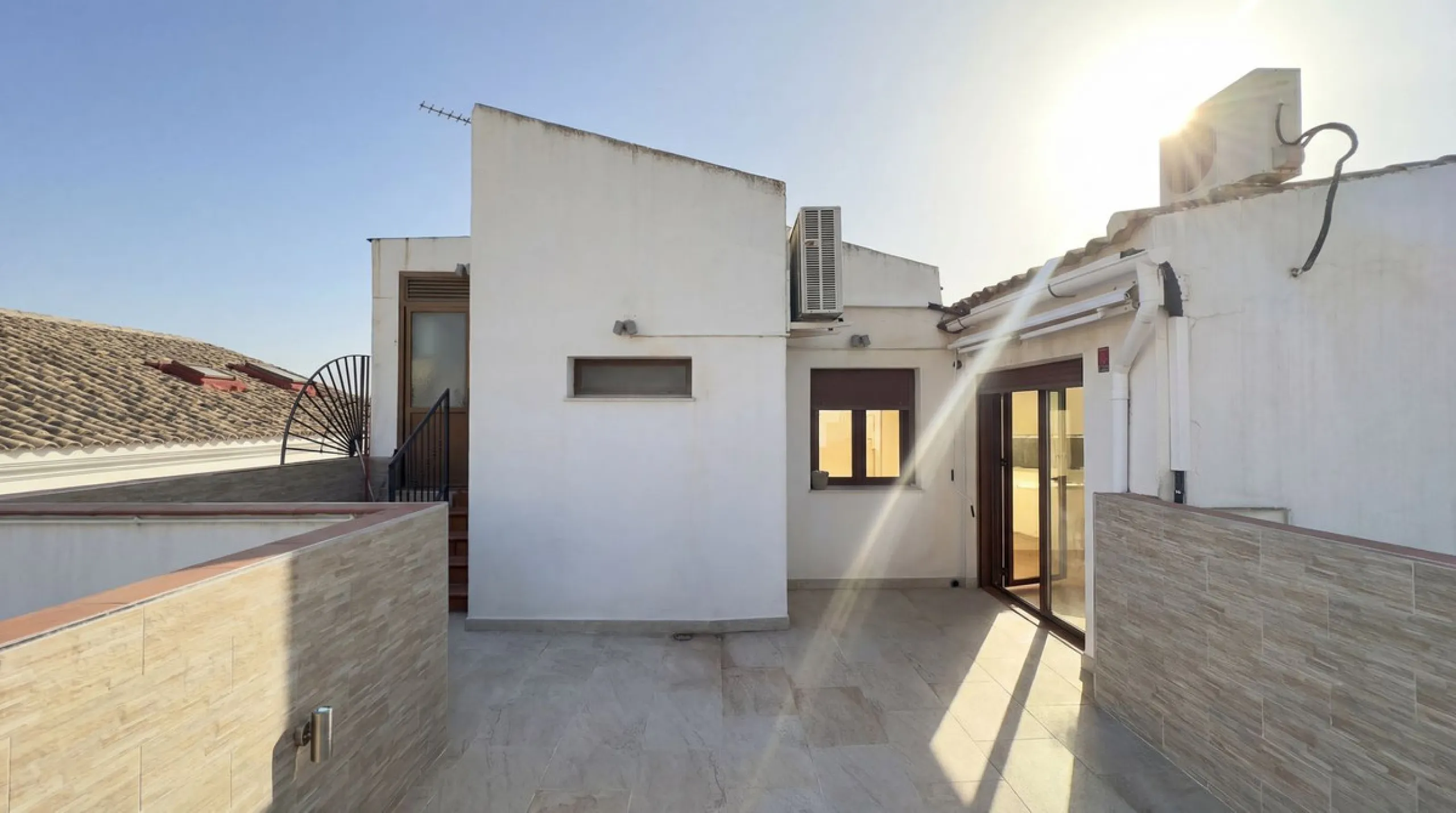 Spacious and stylish apartment with rooftop terrace and additional living level in the heart of Ronda