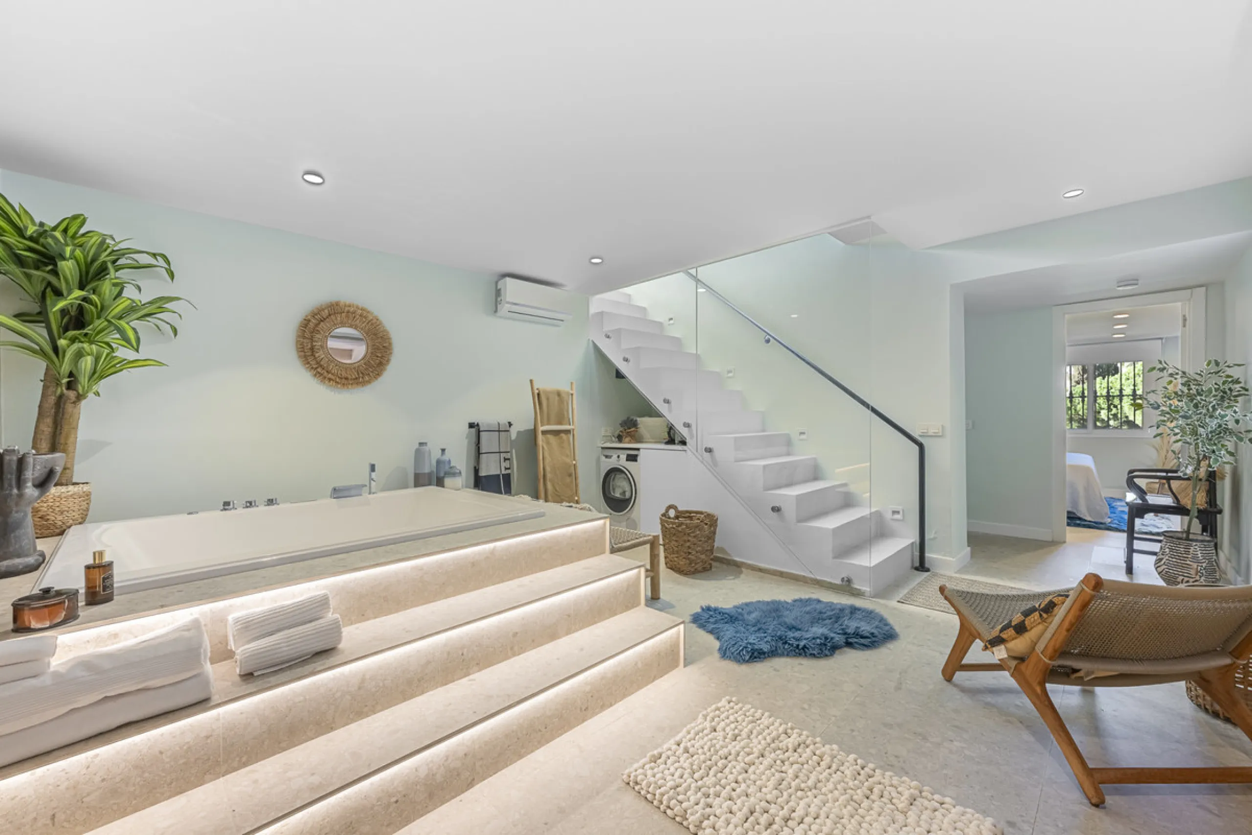 Situated in the sought-after urbanisation of Arco Iris in Altos de Puente Romano, this exceptional townhouse offers a rare opportunity to own one of the most spacious homes within the community. Set in the heart of Marbella's Golden Mile, just a short wal