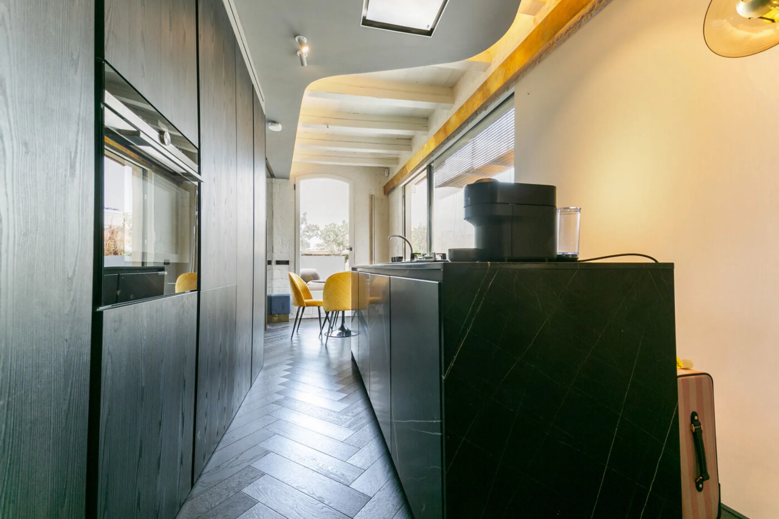 Piso ático con vistas panorámicas y amplia terraza privada en el centro de Barcelona