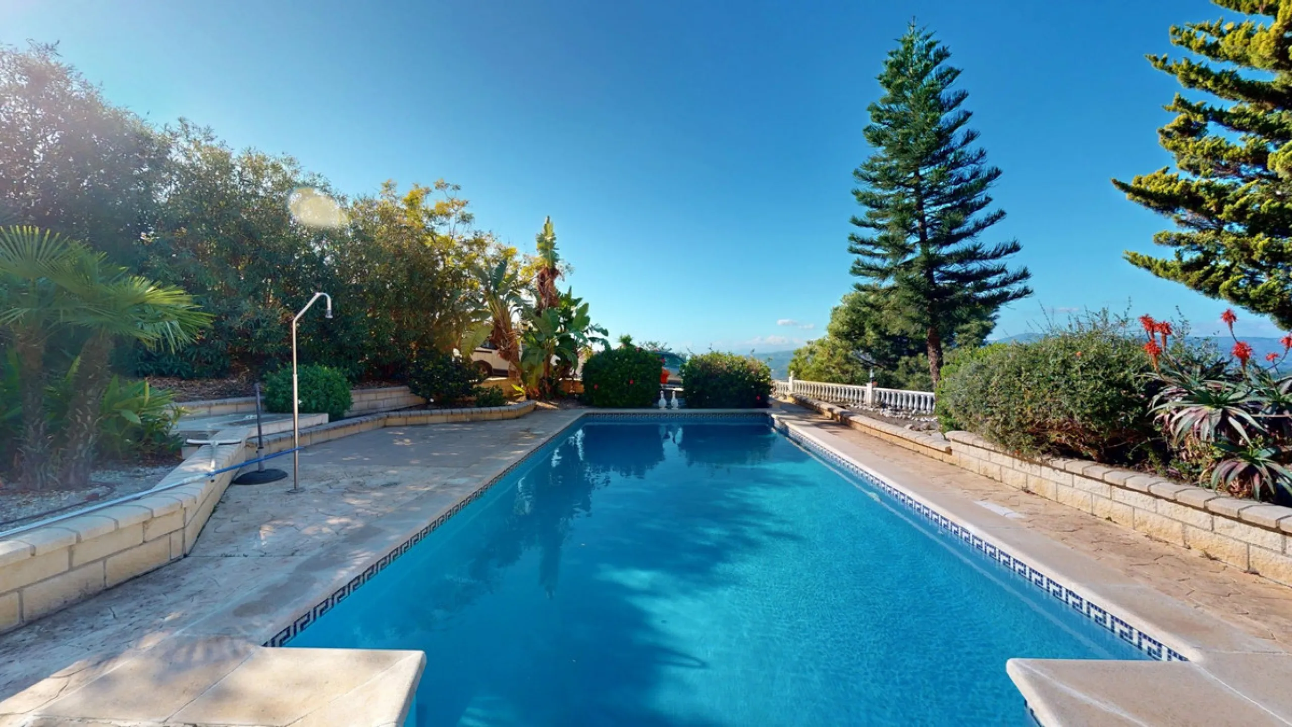This elegant villa in Arenas, Málaga, offers a harmonious blend of space and style across two levels. The residence boasts four bedrooms and three bathrooms, with the primary bedroom providing generous personal space. The ground floor houses the main livi