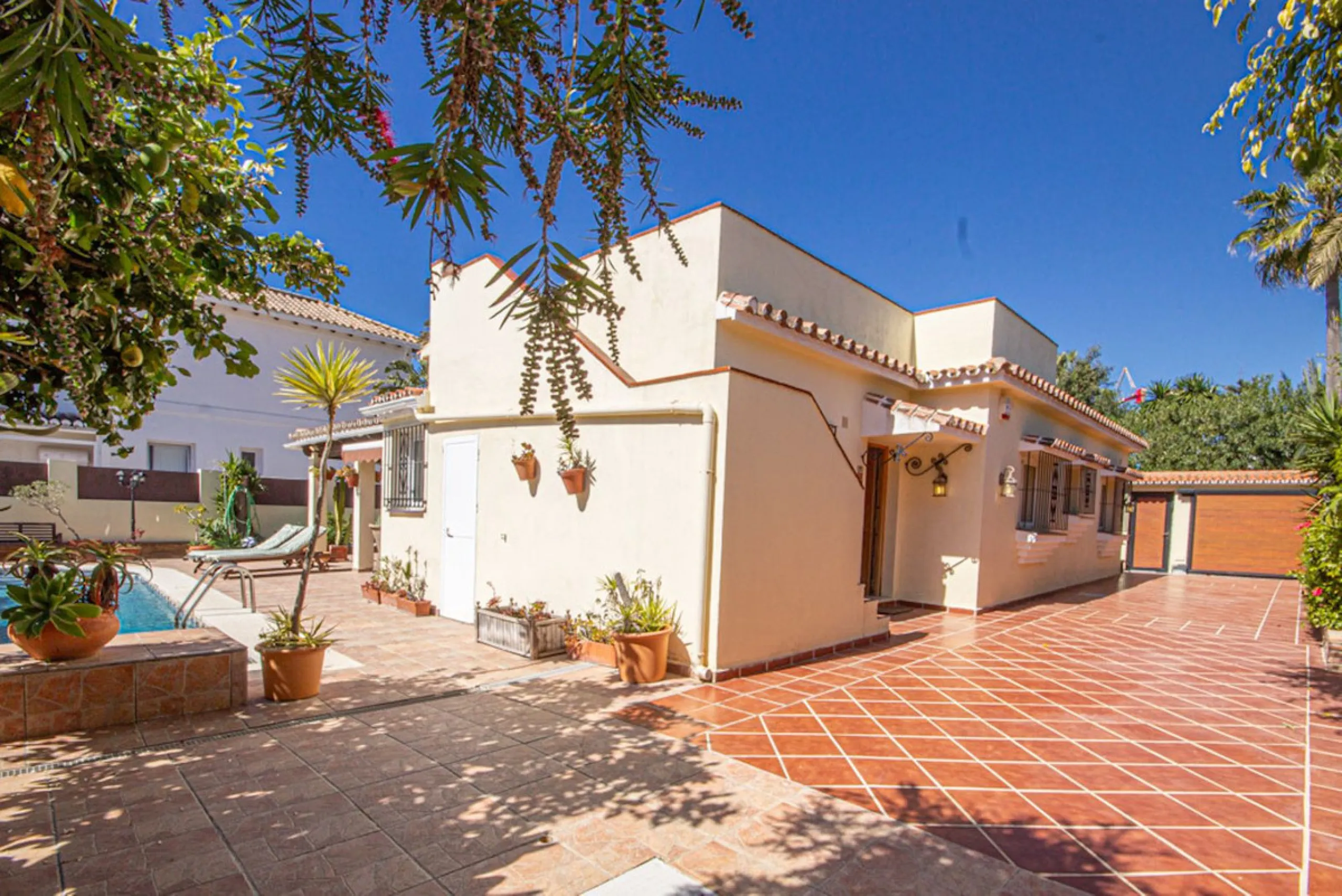 Charming Beachside Bungalow with Renovation Potential in Carib Playa