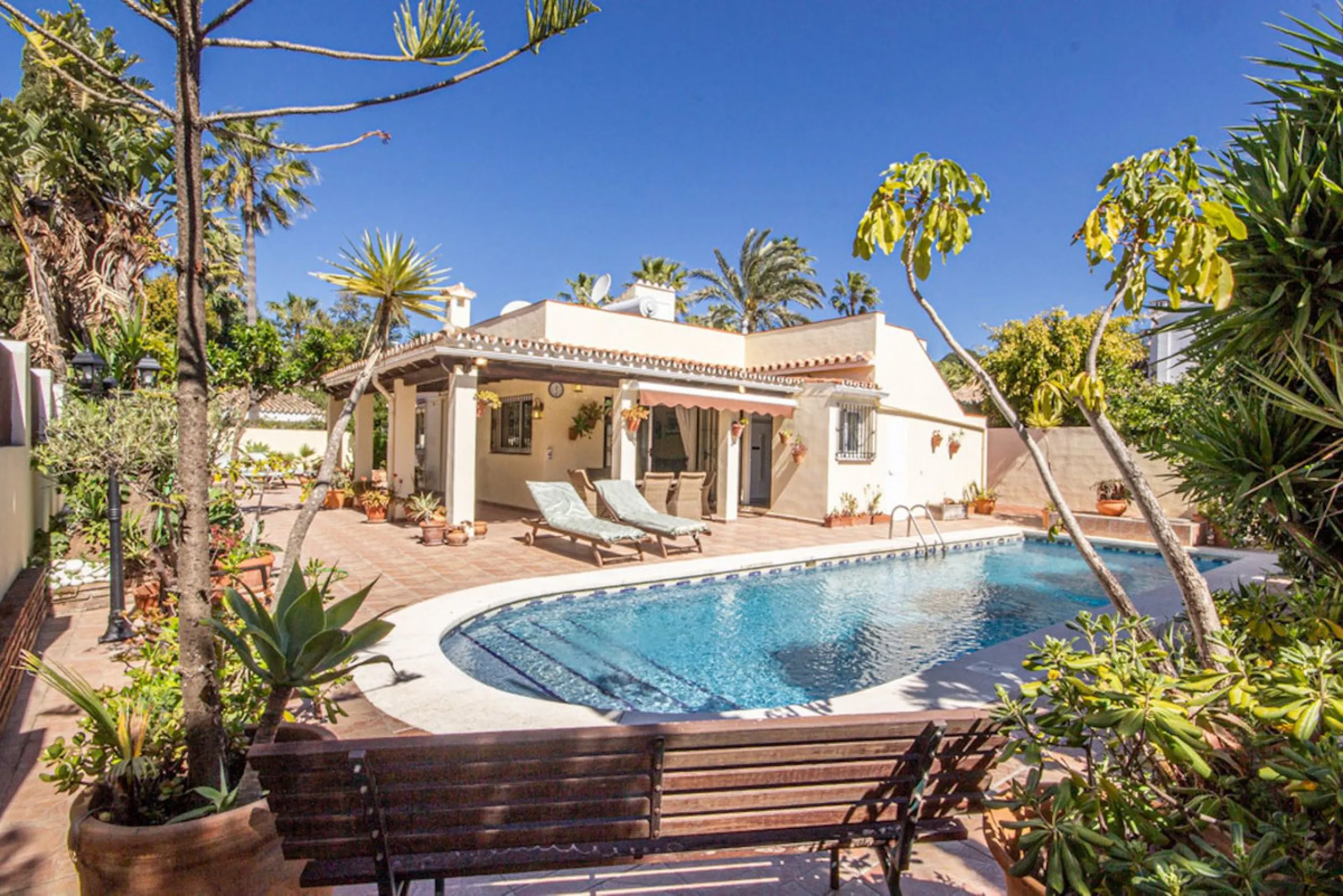 Charming Beachside Bungalow with Renovation Potential in Carib Playa