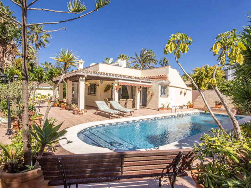 Charming Beachside Bungalow with Renovation Potential in Carib Playa