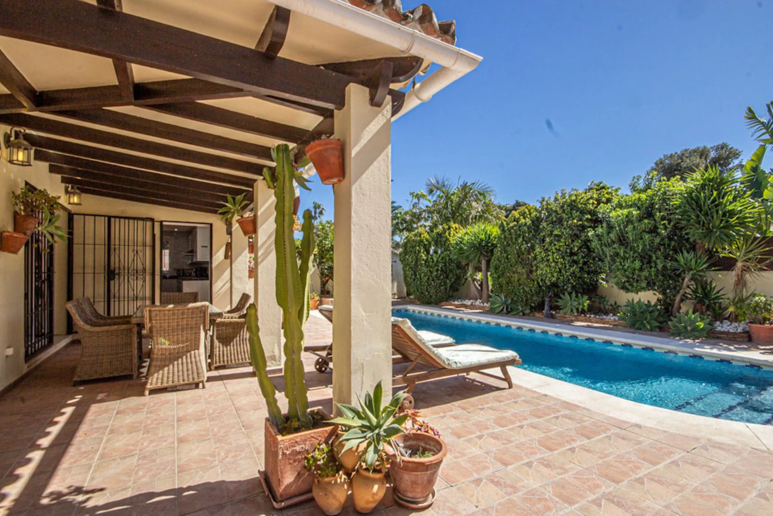 Charming Beachside Bungalow with Renovation Potential in Carib Playa