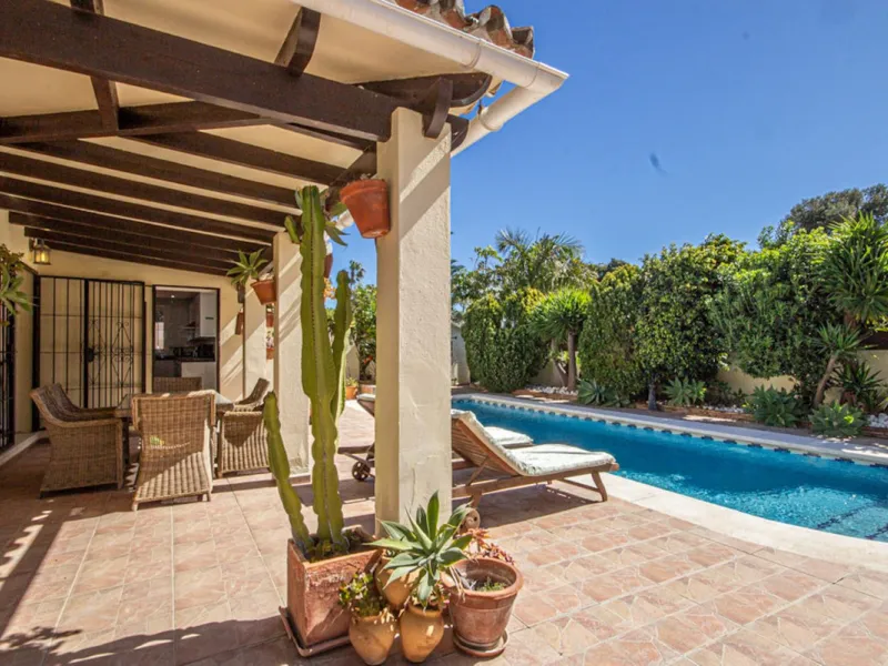 Charming Beachside Bungalow with Renovation Potential in Carib Playa