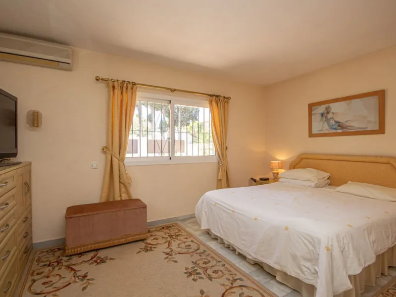 Charming Beachside Bungalow with Renovation Potential in Carib Playa