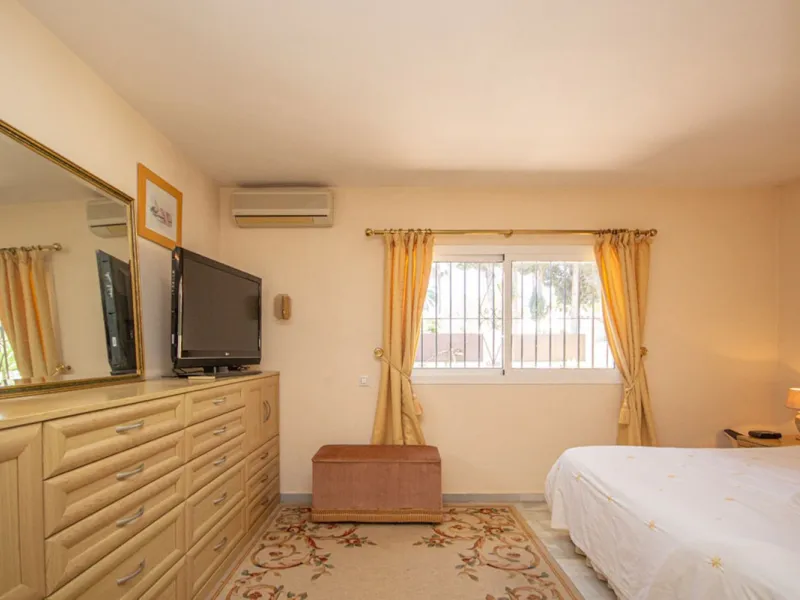 Charming Beachside Bungalow with Renovation Potential in Carib Playa