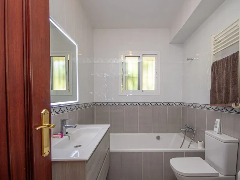 Charming Beachside Bungalow with Renovation Potential in Carib Playa