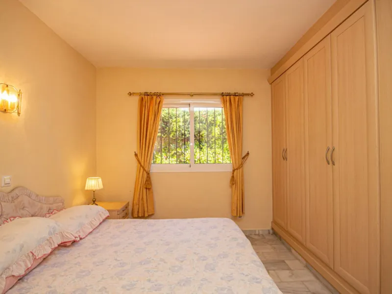 Charming Beachside Bungalow with Renovation Potential in Carib Playa