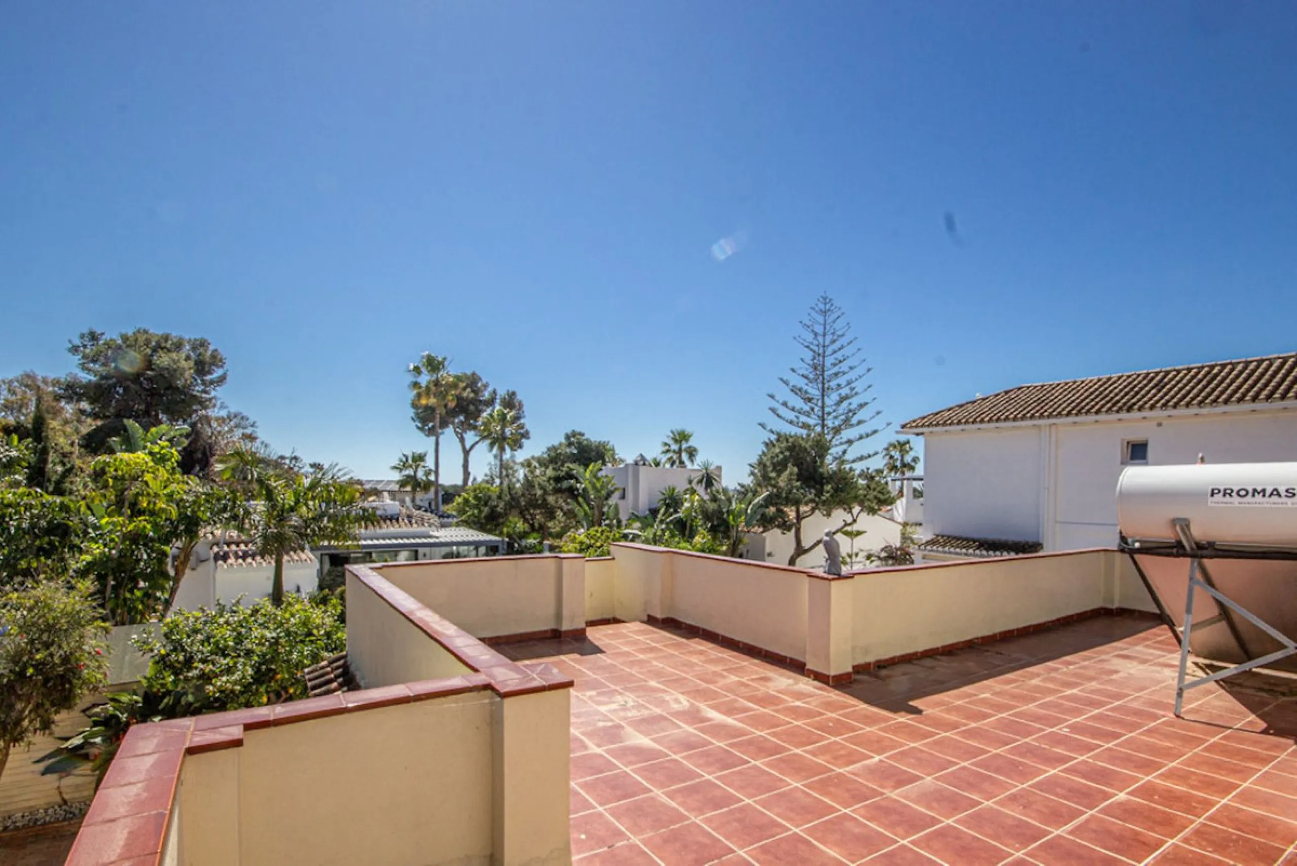Charming Beachside Bungalow with Renovation Potential in Carib Playa