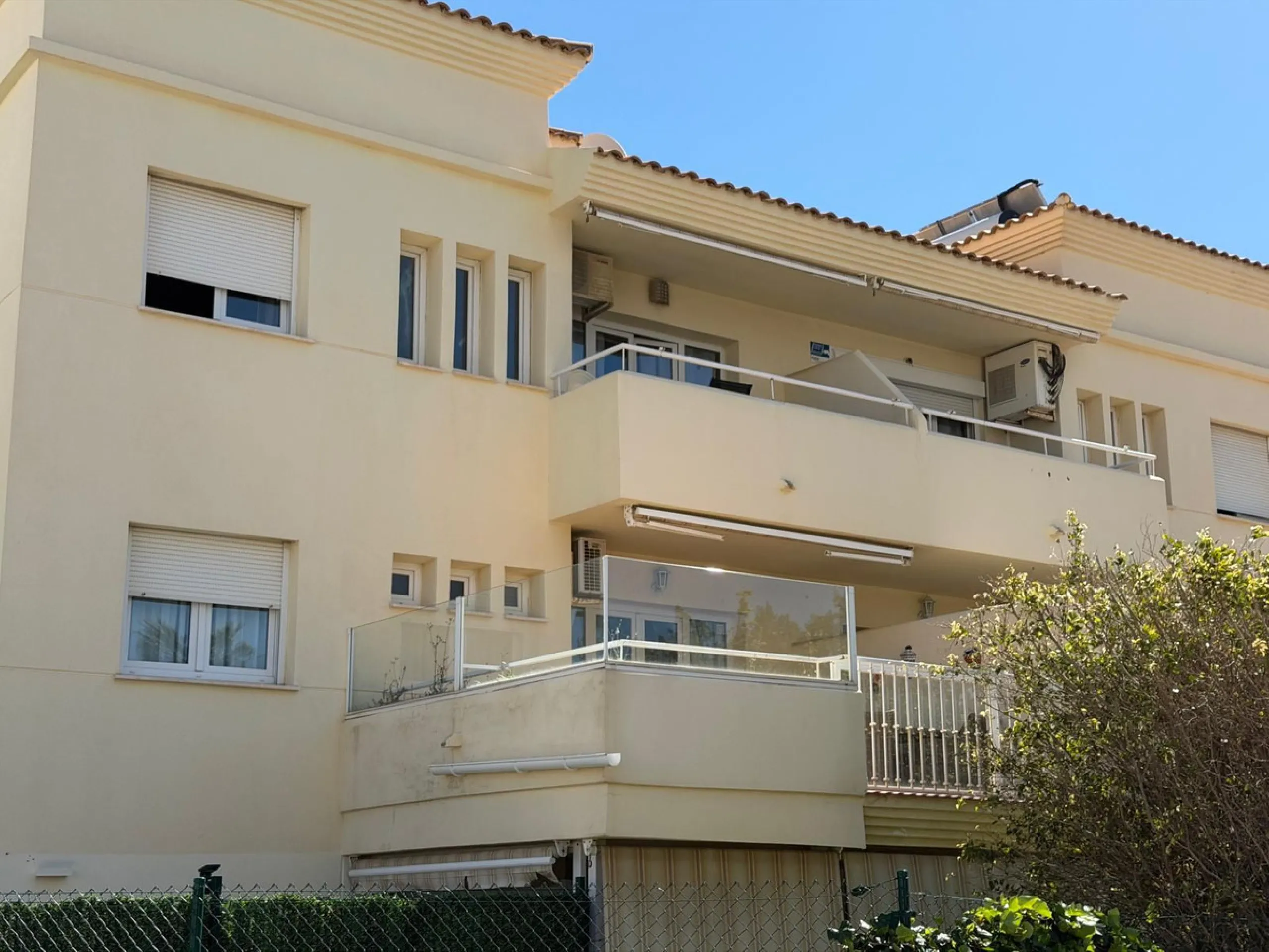 The property features 2 bedrooms and 2 bathrooms, making it ideal for both permanent living and holiday use. The apartment is in good condition and is sold fully furnished, with the exception of the terrace furniture.
