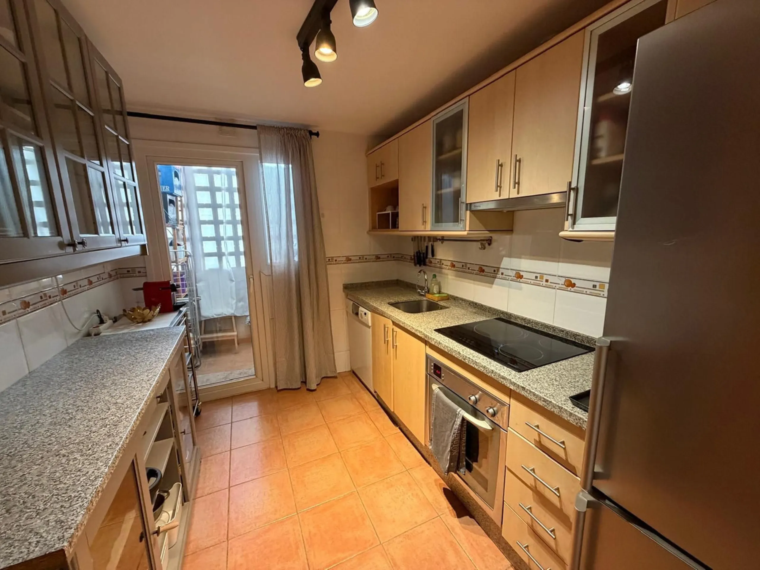 The property features 2 bedrooms and 2 bathrooms, making it ideal for both permanent living and holiday use. The apartment is in good condition and is sold fully furnished, with the exception of the terrace furniture.