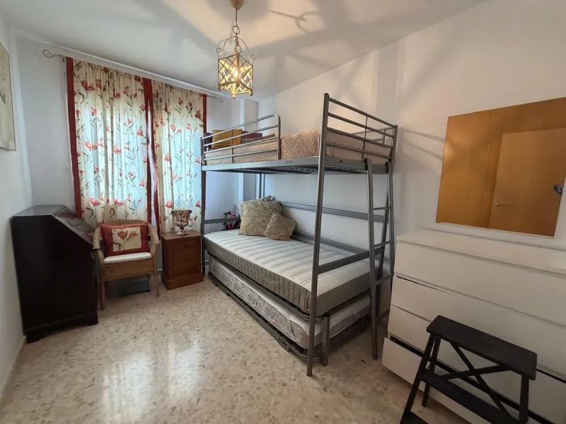 The property features 2 bedrooms and 2 bathrooms, making it ideal for both permanent living and holiday use. The apartment is in good condition and is sold fully furnished, with the exception of the terrace furniture.
