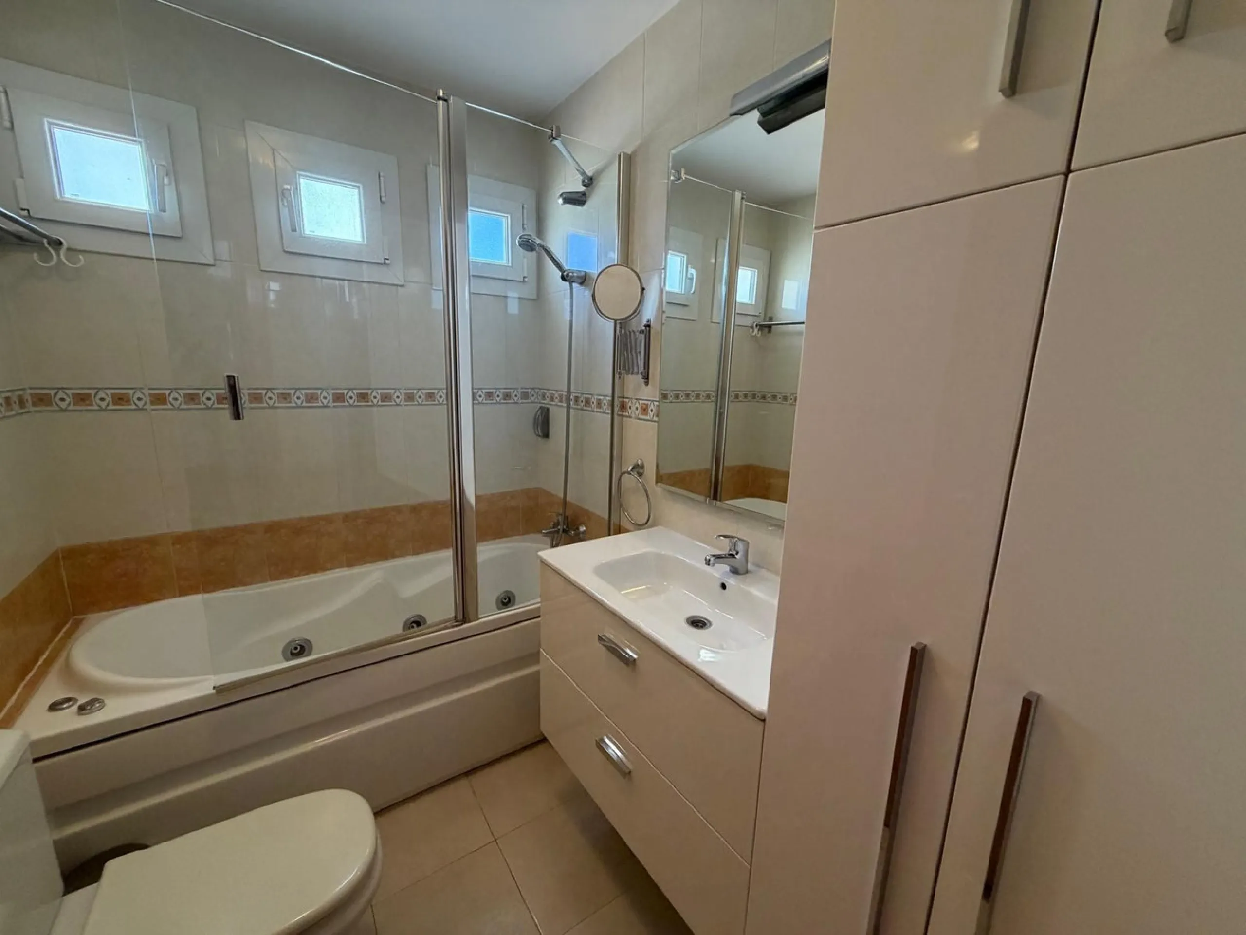 The property features 2 bedrooms and 2 bathrooms, making it ideal for both permanent living and holiday use. The apartment is in good condition and is sold fully furnished, with the exception of the terrace furniture.