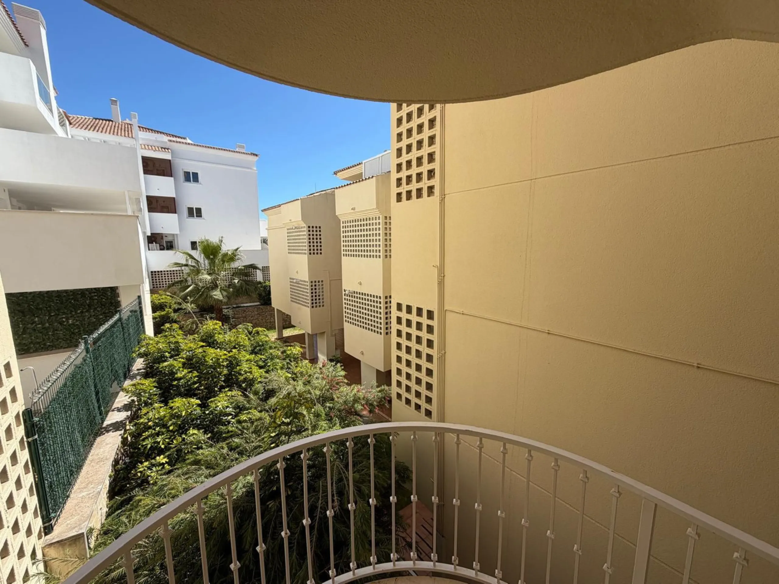 The property features 2 bedrooms and 2 bathrooms, making it ideal for both permanent living and holiday use. The apartment is in good condition and is sold fully furnished, with the exception of the terrace furniture.