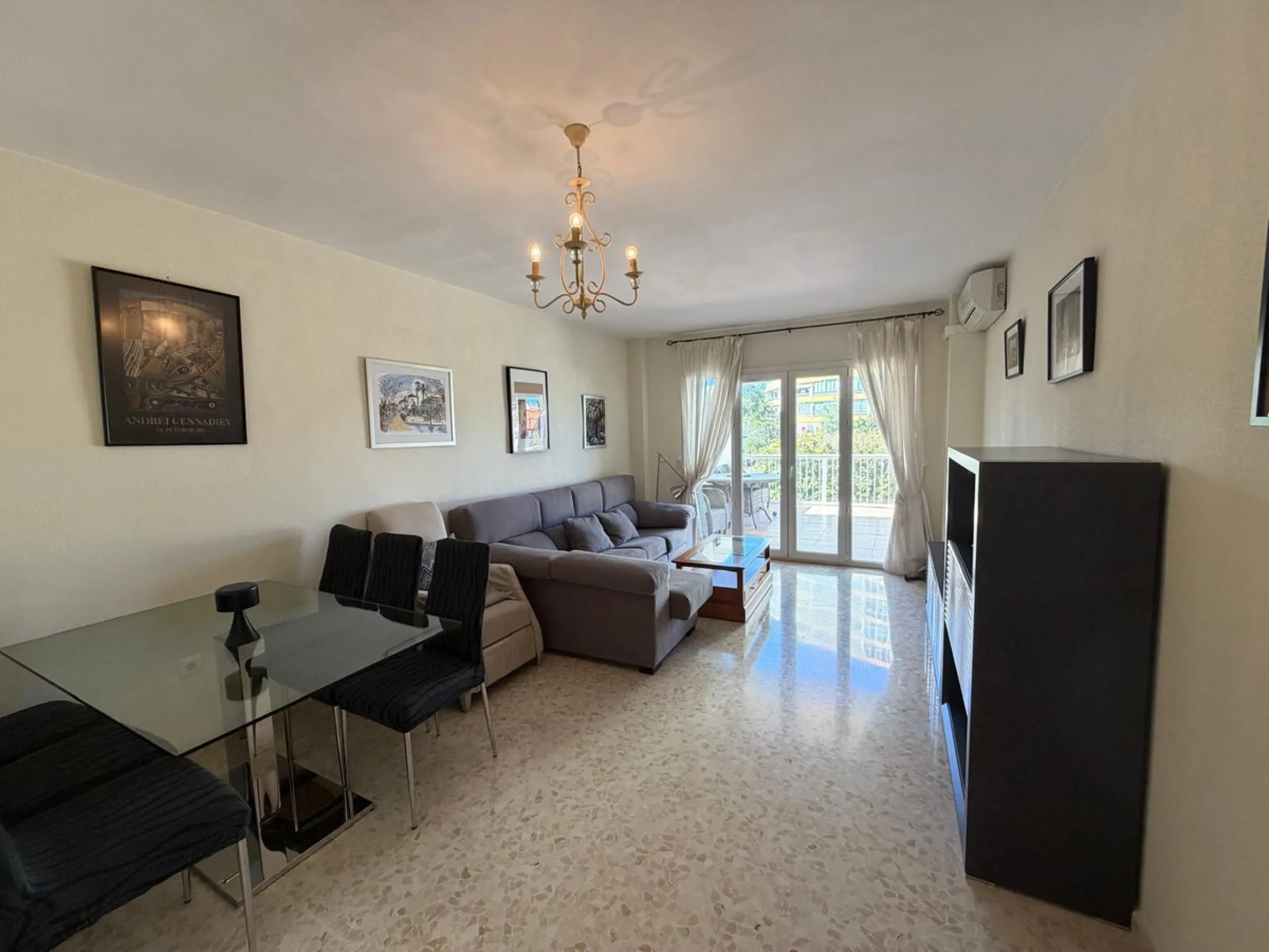 The property features 2 bedrooms and 2 bathrooms, making it ideal for both permanent living and holiday use. The apartment is in good condition and is sold fully furnished, with the exception of the terrace furniture.