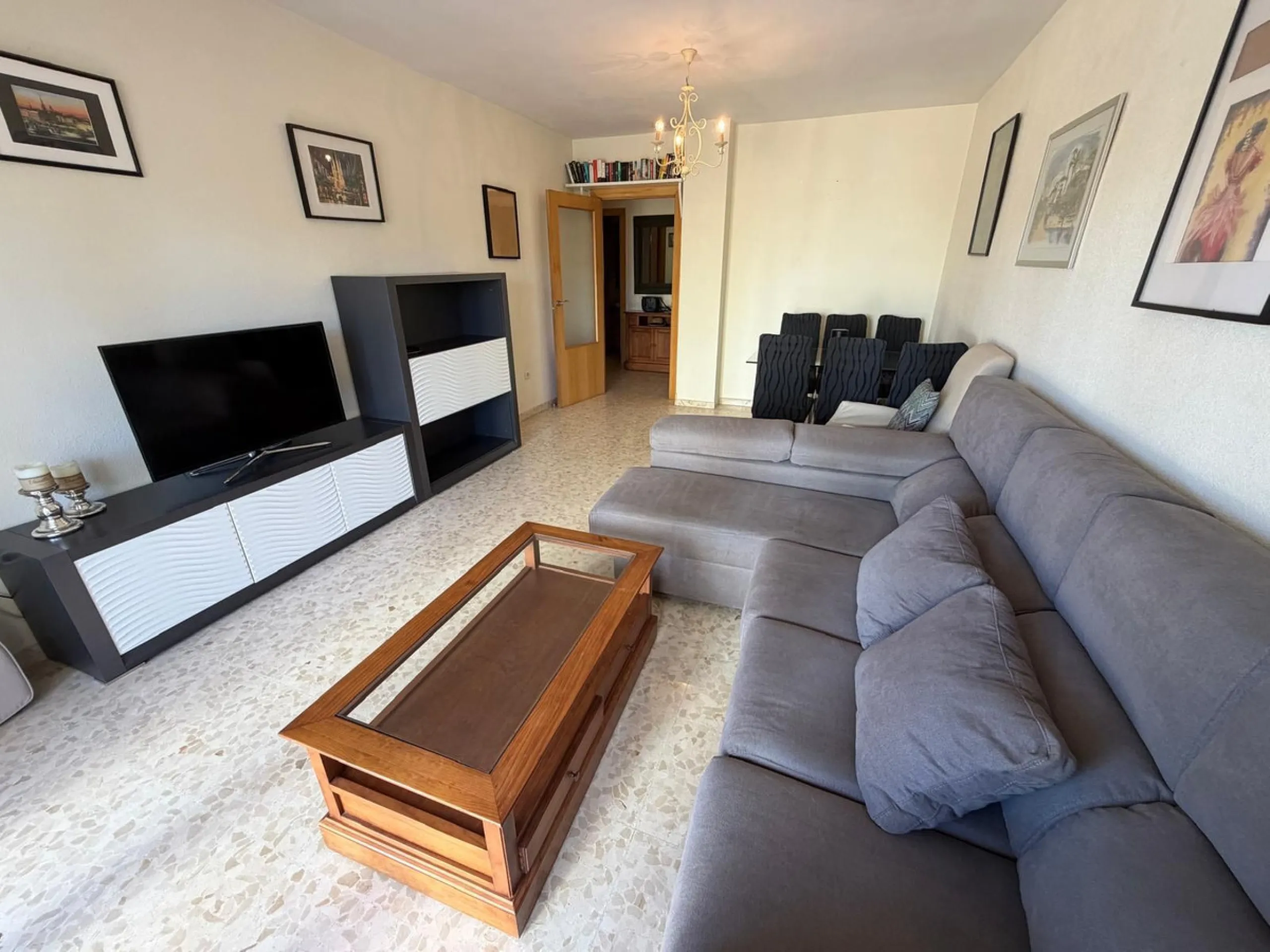 The property features 2 bedrooms and 2 bathrooms, making it ideal for both permanent living and holiday use. The apartment is in good condition and is sold fully furnished, with the exception of the terrace furniture.