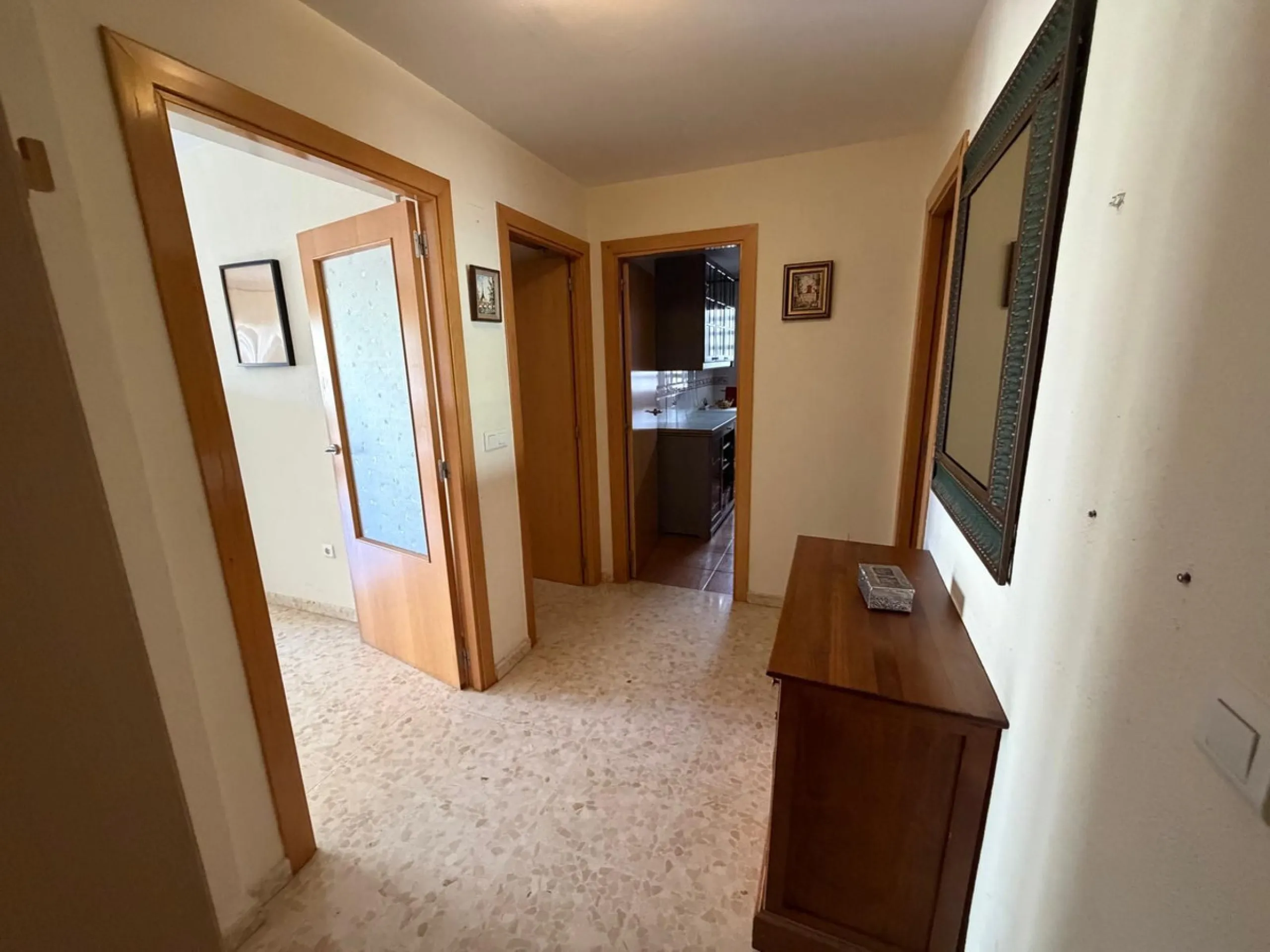 The property features 2 bedrooms and 2 bathrooms, making it ideal for both permanent living and holiday use. The apartment is in good condition and is sold fully furnished, with the exception of the terrace furniture.