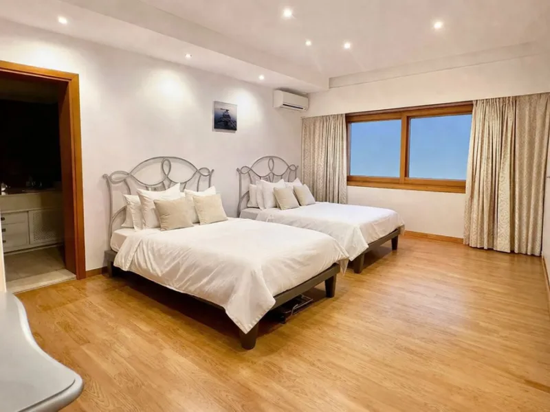 Elegant Marbella Estate on a Prime and Rare Plot — 800 meters Walking Distance to Puerto Banús. Unique Development Opportunity — 4,205m² Plot with Potential for Up to 4 Villas, or Plans for one large villa and separate Guest House, or to knock down and bu