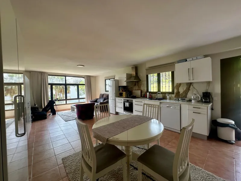 Charming semi-detached house in Calahonda, located on the first line of a golf course within a quiet residential area with a communal pool and beautifully maintained gardens.