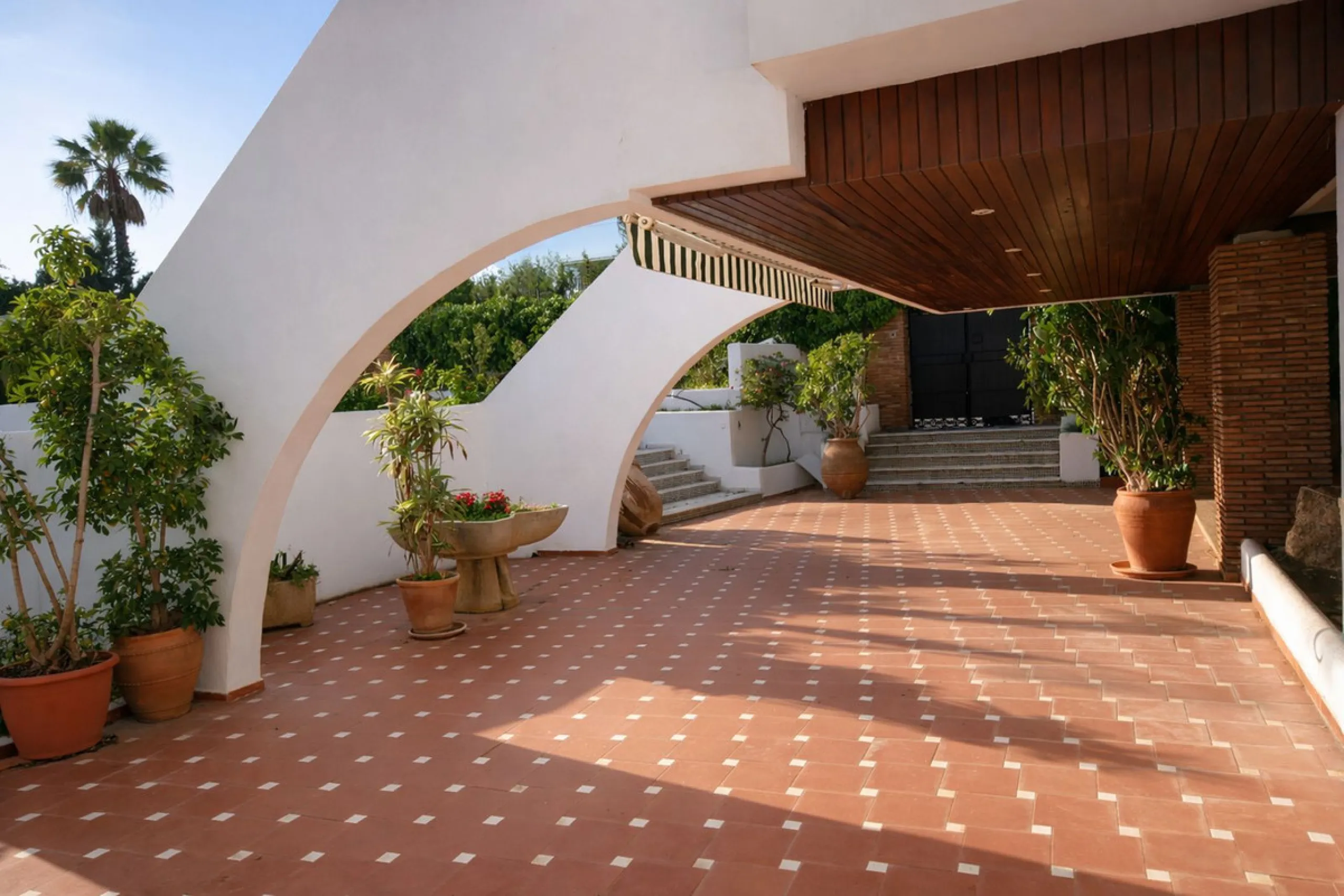Elegant Marbella Estate on a Prime and Rare Plot — 800 meters Walking Distance to Puerto Banús. Unique Development Opportunity — 4,205m² Plot with Potential for Up to 4 Villas, or Plans for one large villa and separate Guest House, or to knock down and bu