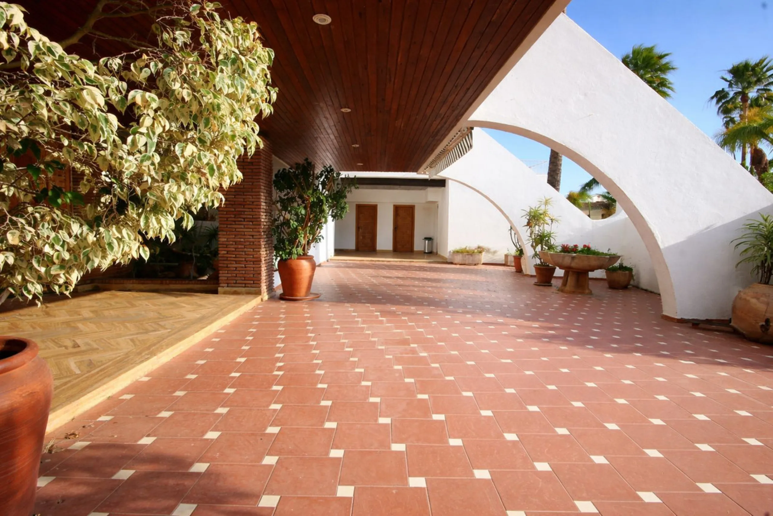 Elegant Marbella Estate on a Prime and Rare Plot — 800 meters Walking Distance to Puerto Banús. Unique Development Opportunity — 4,205m² Plot with Potential for Up to 4 Villas, or Plans for one large villa and separate Guest House, or to knock down and bu