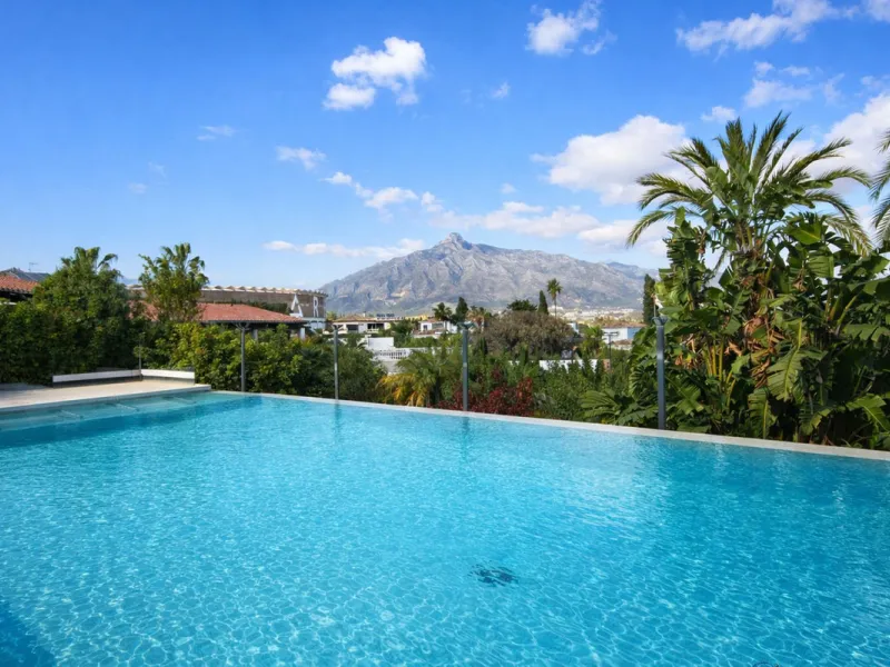 Elegant Marbella Estate on a Prime and Rare Plot — 800 meters Walking Distance to Puerto Banús. Unique Development Opportunity — 4,205m² Plot with Potential for Up to 4 Villas, or Plans for one large villa and separate Guest House, or to knock down and bu