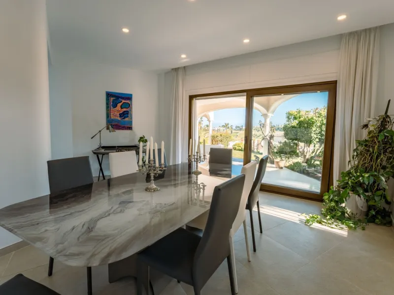 An exceptional south-facing villa, exquisitely modernised, occupying a privileged second-line golf position in El Paraíso, offering breathtaking 180-degree panoramic views across the golf course to the Mediterranean Sea and the North African coastline.
