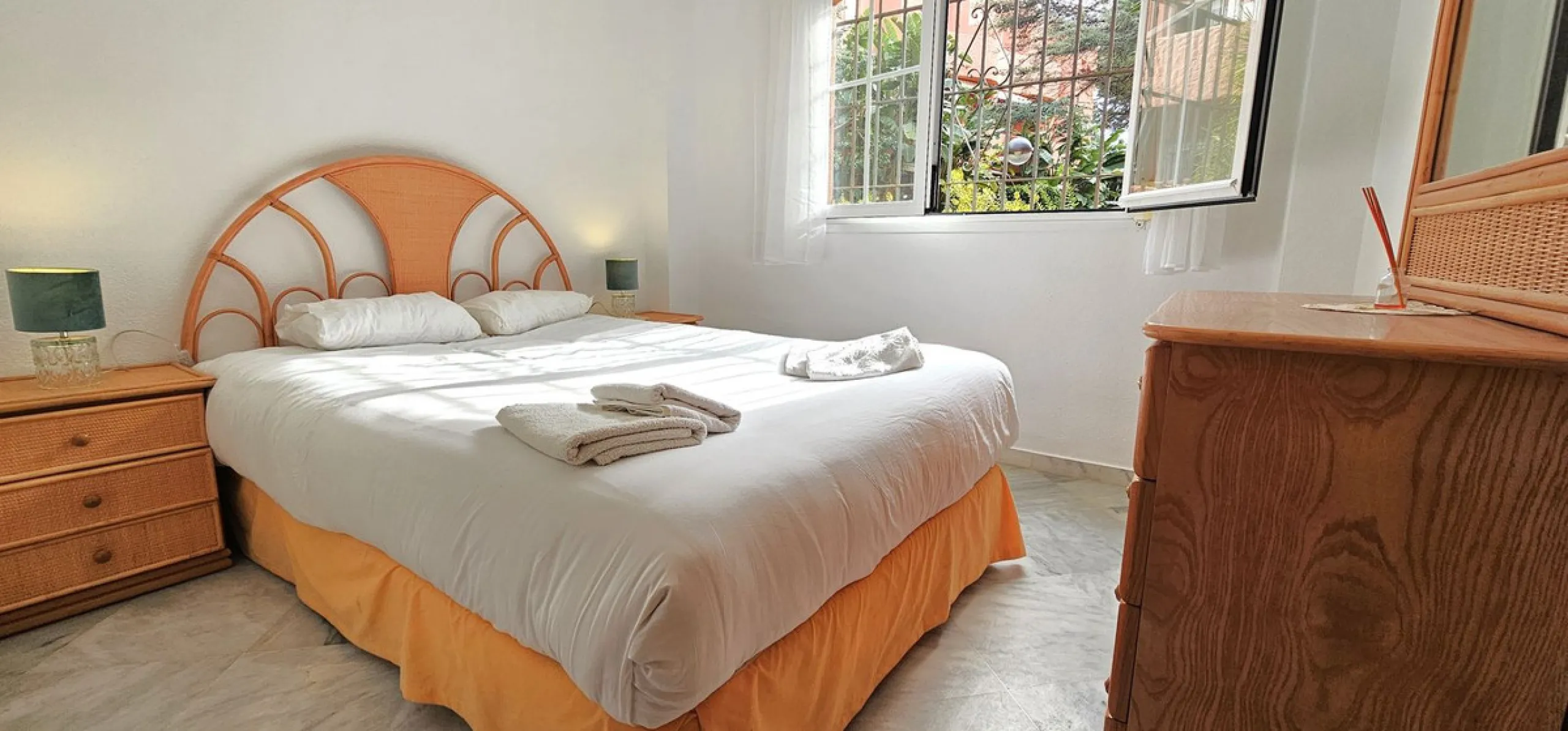 Fantastic, spacious and bright seaside elevated ground floor corner apartment, in a beachfront residential complex, located on one of the best beaches in Marbella. It features a large, very pleasant terrace that surrounds the entire property, perfect for 