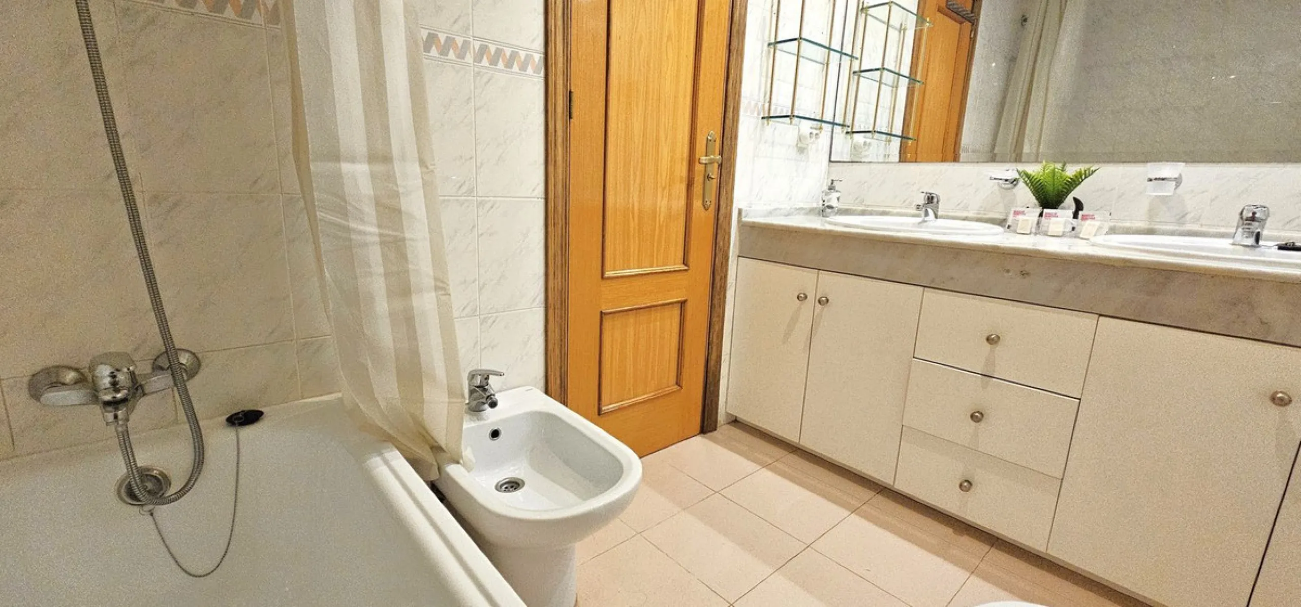 Fantastic, spacious and bright seaside elevated ground floor corner apartment, in a beachfront residential complex, located on one of the best beaches in Marbella. It features a large, very pleasant terrace that surrounds the entire property, perfect for 